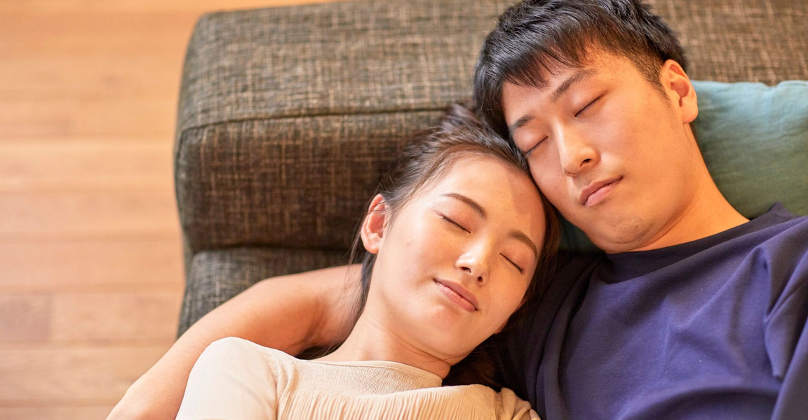 A couple sleeping next to each other. A couple sleeping next to each other.