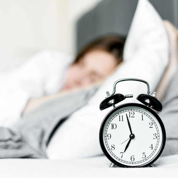 Bed and alarm clock. Bed and alarm clock.