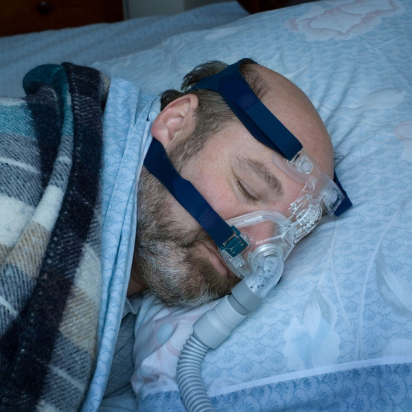 many lying in bed with CPAP machine