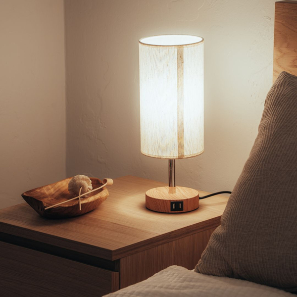 A bedroom nightstand. A bedroom nightstand.