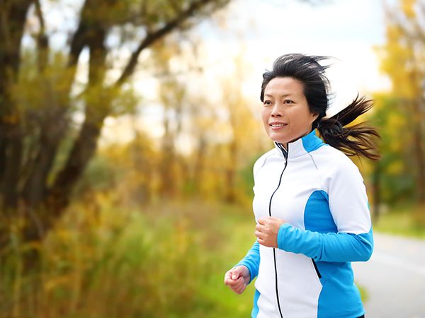 a woman jogging outside