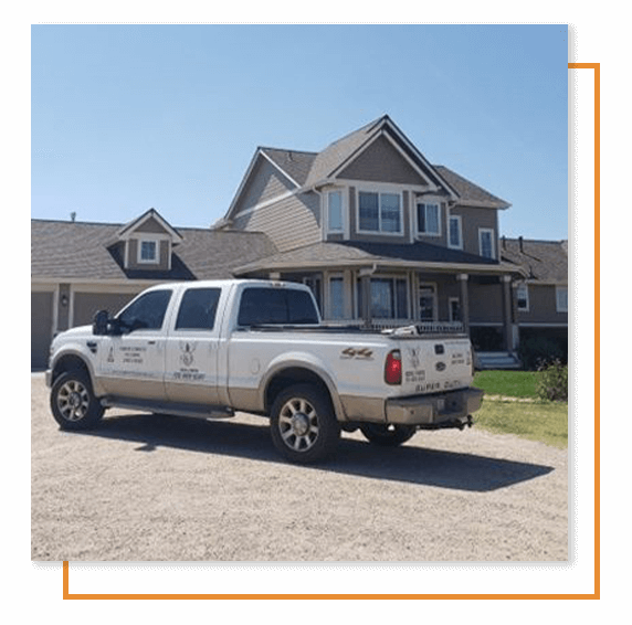 a S&R Eagle Services truck outside of a residence