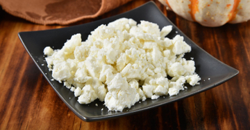 An image of feta cheese on a plate.