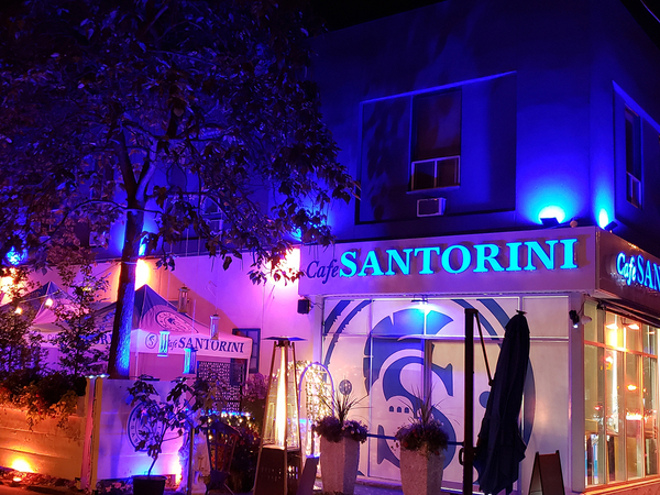 Cafe Santorini lit up at night. 