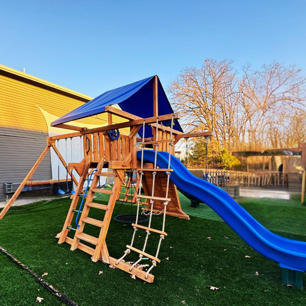 A playset with a blue slide