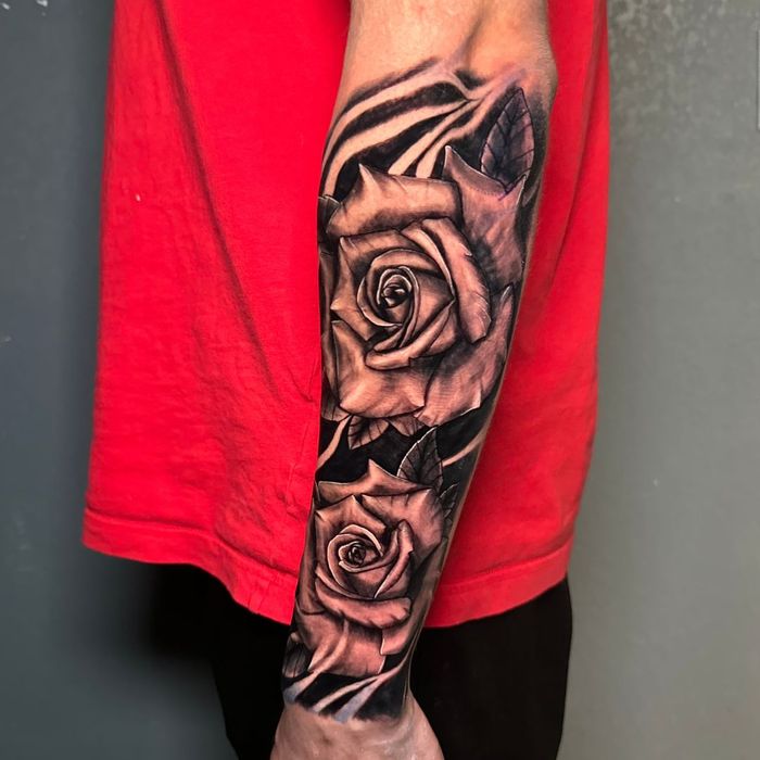 rose tattoo sleeve by Daniel