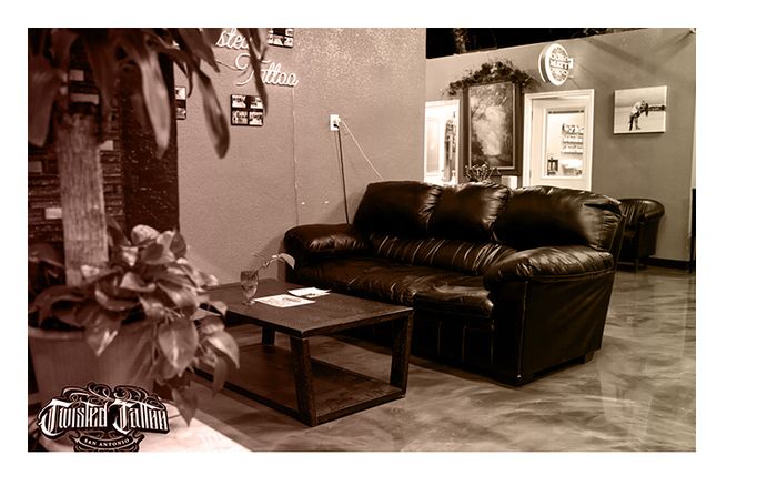 Couch and interior at Twisted Tattoo