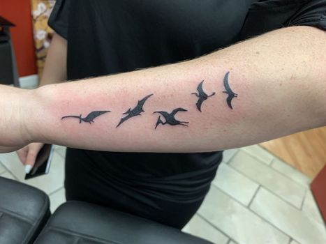 Dinosaur Tattoo | Denise | Twisted Tattoo