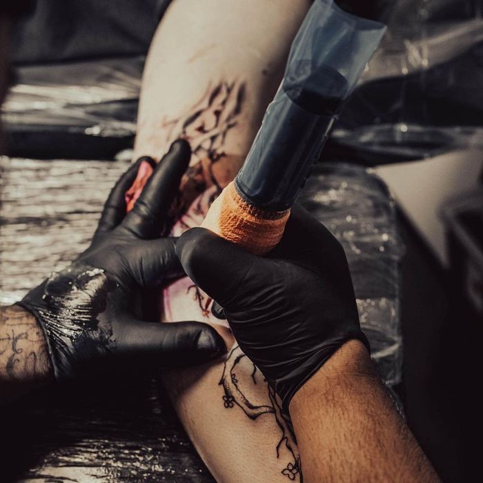 elaborate arm tattoo
