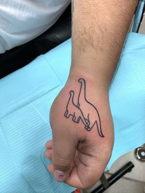 Dinosaur Tattoo | Denise | Twisted Tattoo