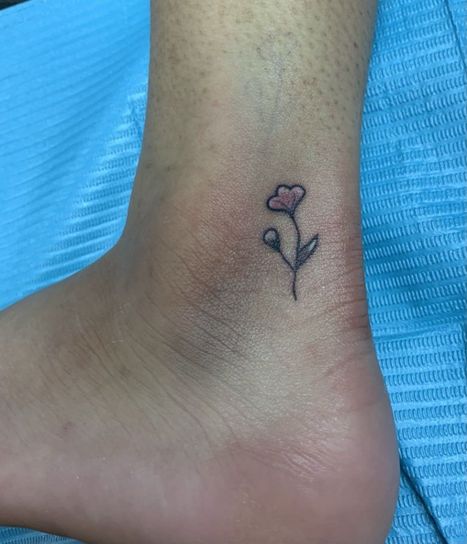 Tiny Flower Tattoo | Denise | Twisted Tattoo