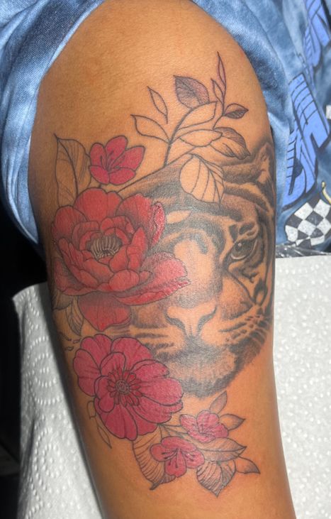 Cub Flower Tattoo | Twisted Tattoo