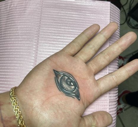 Eye Palm Tattoo | Denise | Twisted Tattoo