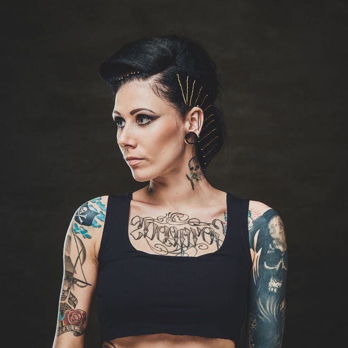 portrait of person with tattoos
