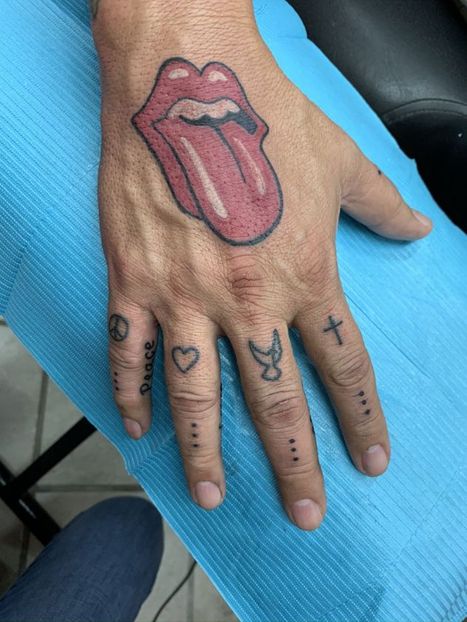 Tongue and Finger Tattoo | Denise | Twisted Tattoo