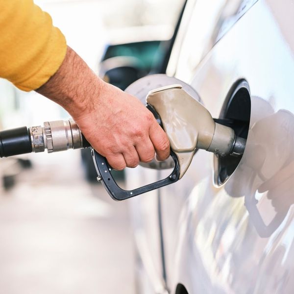 putting gas into a car