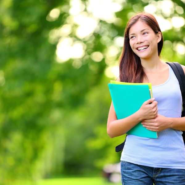 college student with folders