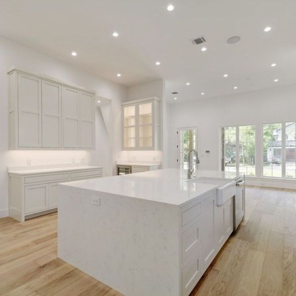 modern kitchen with white cabinets and countertops  modern kitchen with white cabinets and countertops