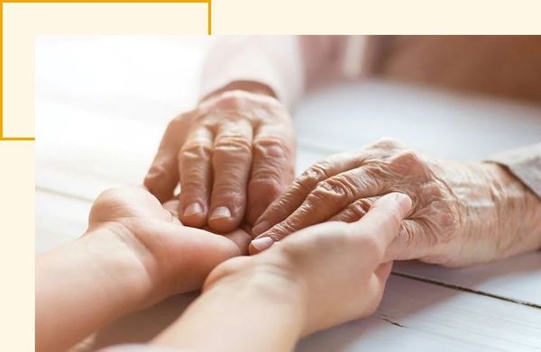 2 people holding hands on a surface